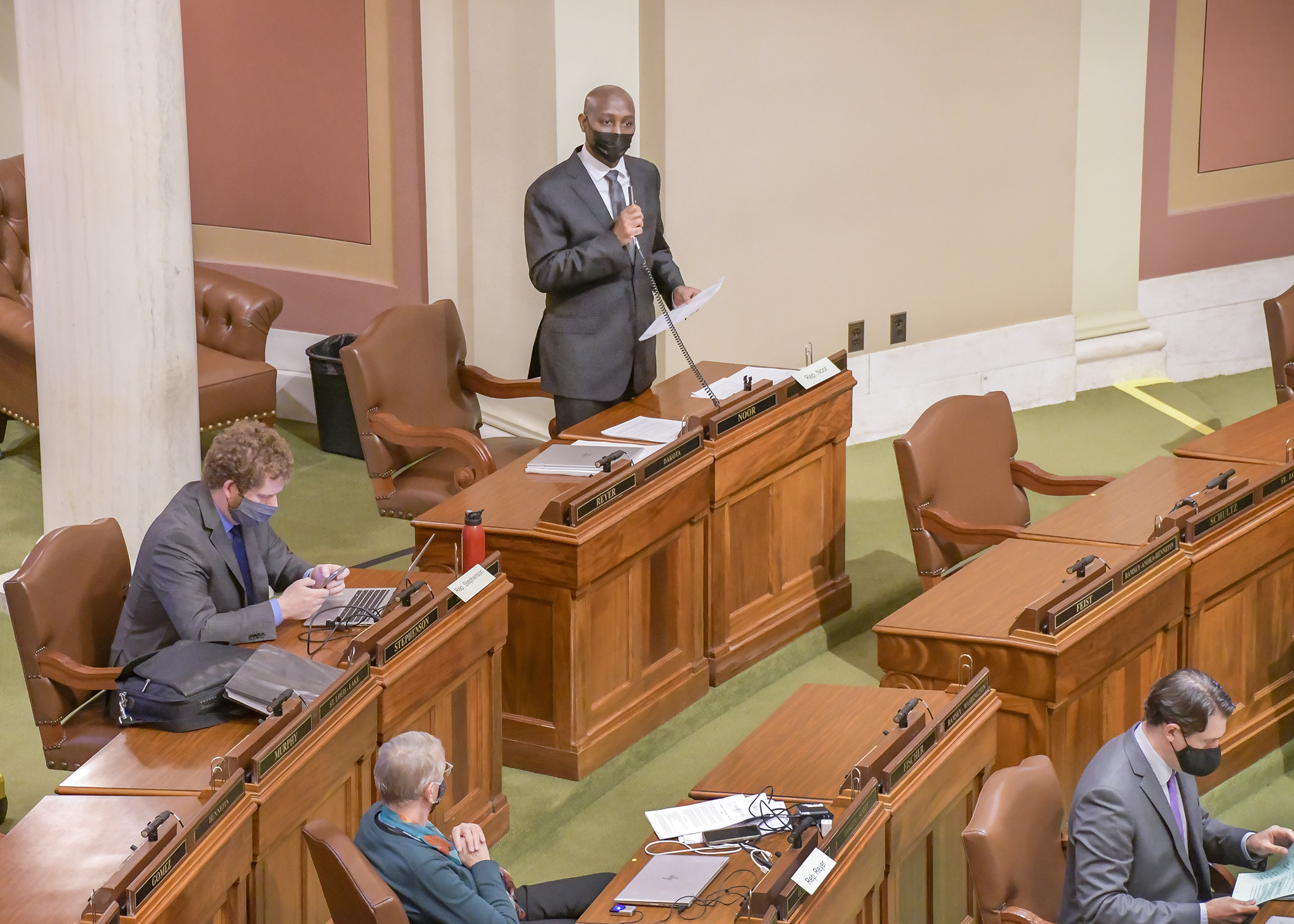 Rep. Mohamud Noor presents SF1098, the omnibus workforce and business development finance and policy bill, on the House Floor Tuesday. Photo by Andrew VonBank